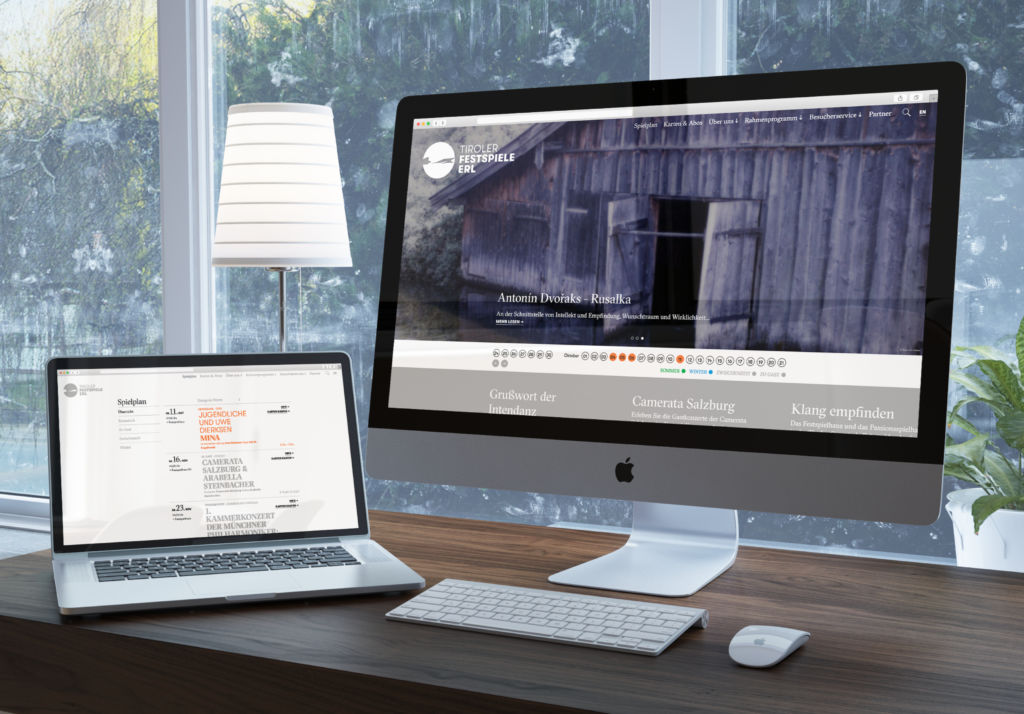 Ansicht der neuen Website der Tiroler Festspiele Erl auf Laptop sowie Bildschirm